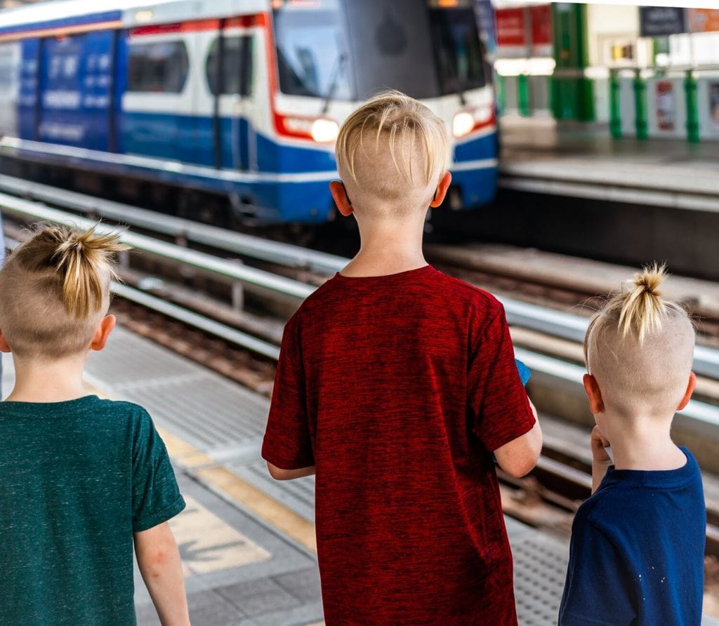 family travel- my boys at the train station